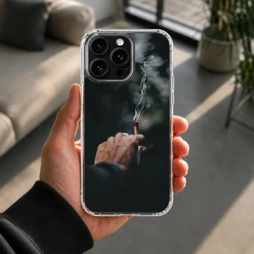 Close-up photographic print of a hand holding a lit cigarette with curling smoke against a dark background phone case — Lifestyle