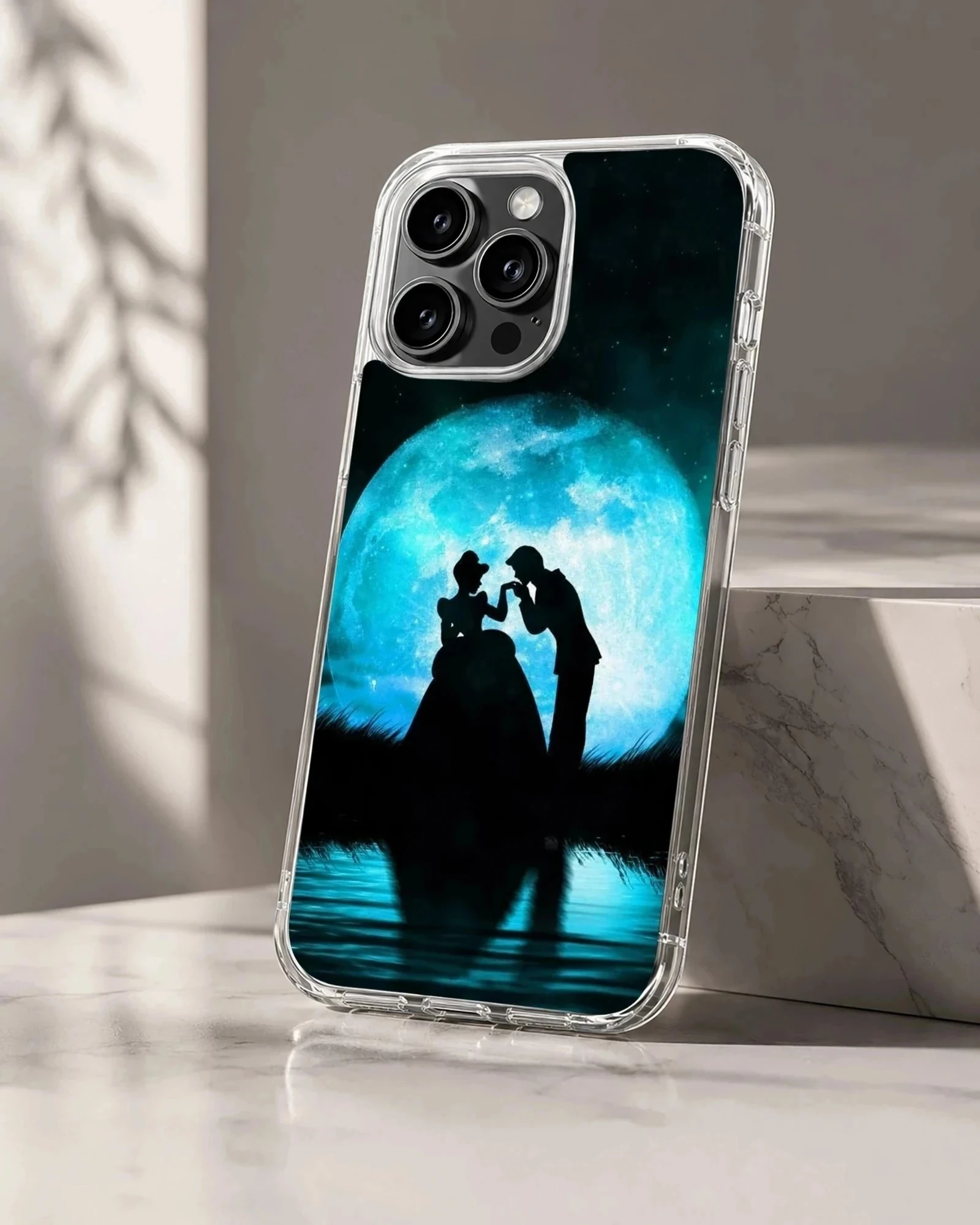 Cinderella silhouette standing before a glowing blue moon on a phone case