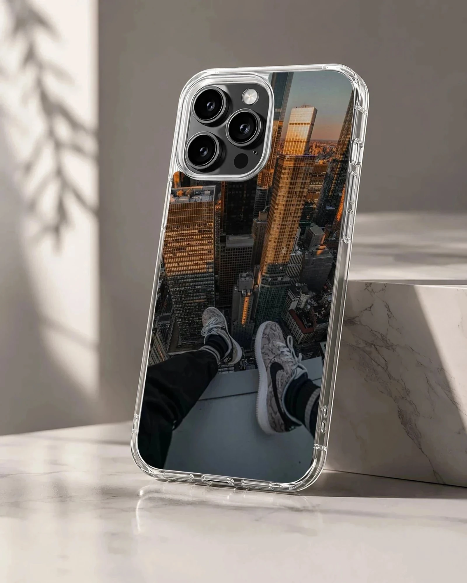 Aerial photograph of a towering city skyline from a high ledge, printed on a phone case