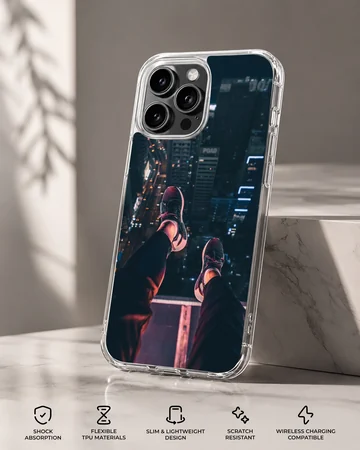 Urban photography of dangling legs overlooking a city at night on a phone case — Specs