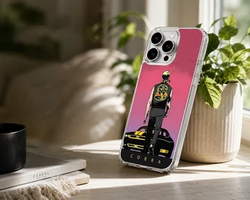 Illustrated graphic of a martial artist walking toward a muscle car under a pink sky on a phone case — Lifestyle