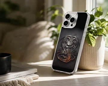 Metallic serpent emblem artwork on a dark background phone case — Lifestyle