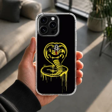 Cobra Kai yellow spray-painted snake emblem artwork on a black background phone case — Lifestyle