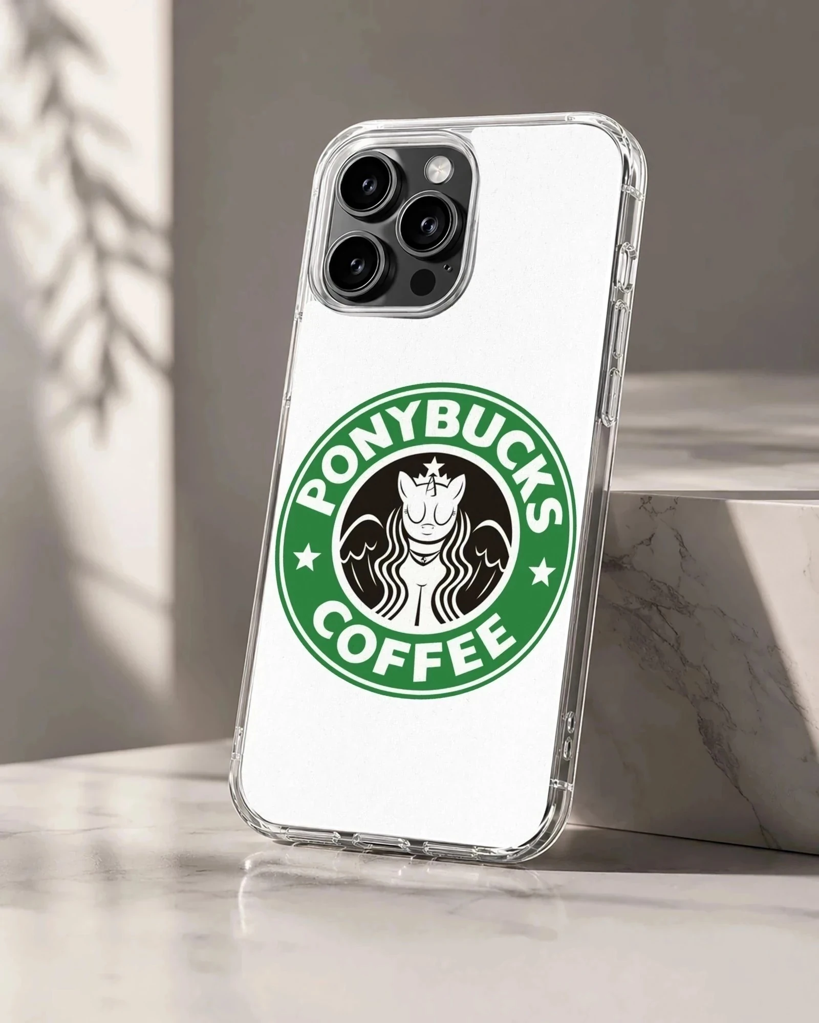 A whimsical green and white coffee parody graphic featuring a stylized creature inside a circular logo on a phone case