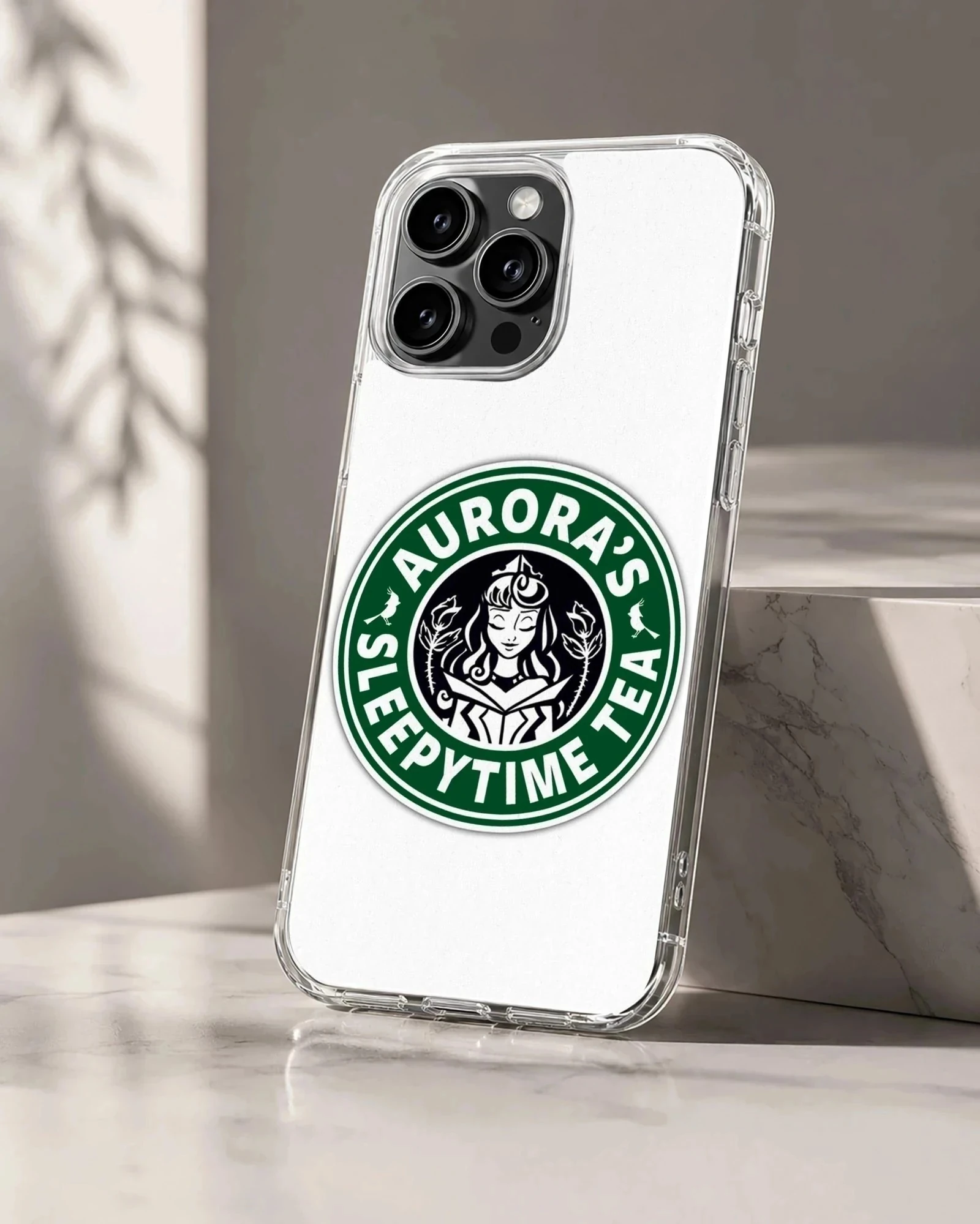 A circular green and white coffee parody illustration featuring a royal cartoon character and typography on a phone case