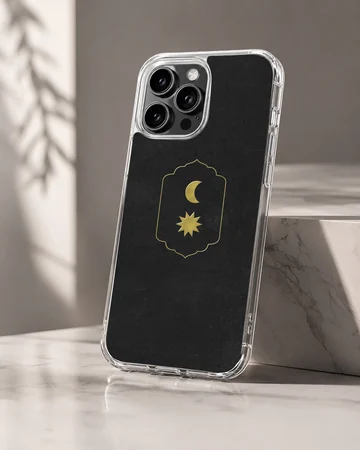 Celestial gold moon and sun emblem on a matte black phone case — Hero