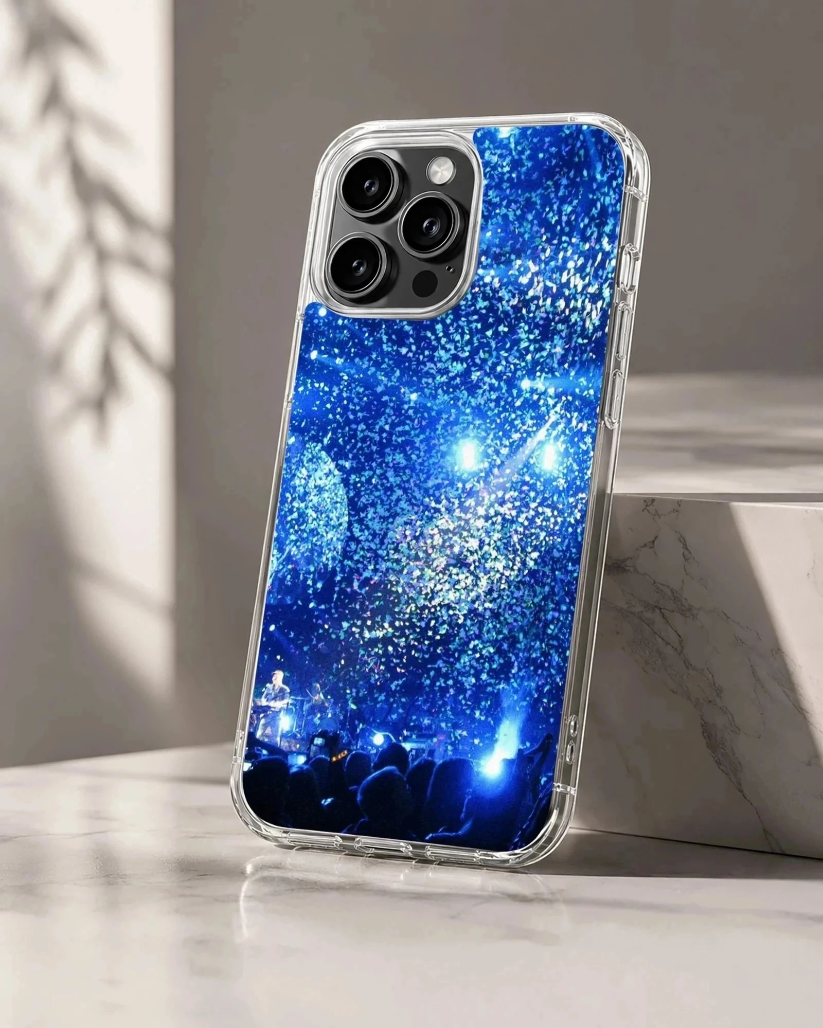 Live concert stadium filled with vibrant blue light and confetti phone case