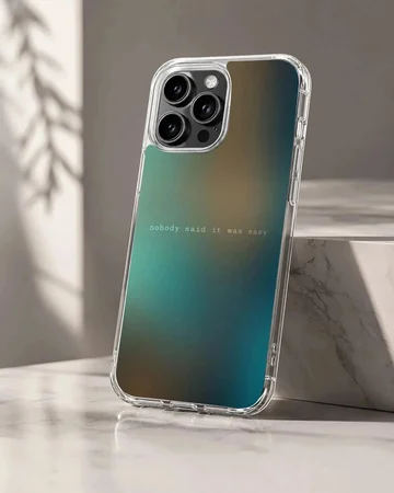 A soft TPU snap case with a blurred teal and amber gradient background and minimalist quote text phone case