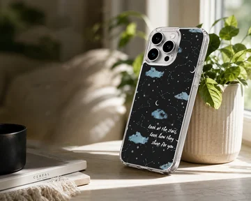 A celestial phone case featuring starry night skies, blue clouds, and handwritten song lyrics on a black background — Lifestyle