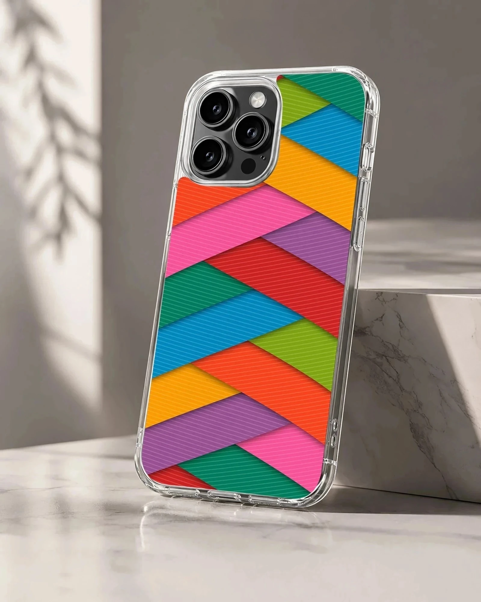 Colorful geometric pattern phone case with layered diagonal stripes in bright hues