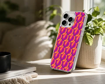 Vibrant repeating abstract S-curve pattern in purple and orange on a slim phone case — Lifestyle