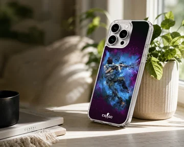 A tactical gaming character emerges from a burst of vibrant blue and purple energy on a matte phone case. — Lifestyle
