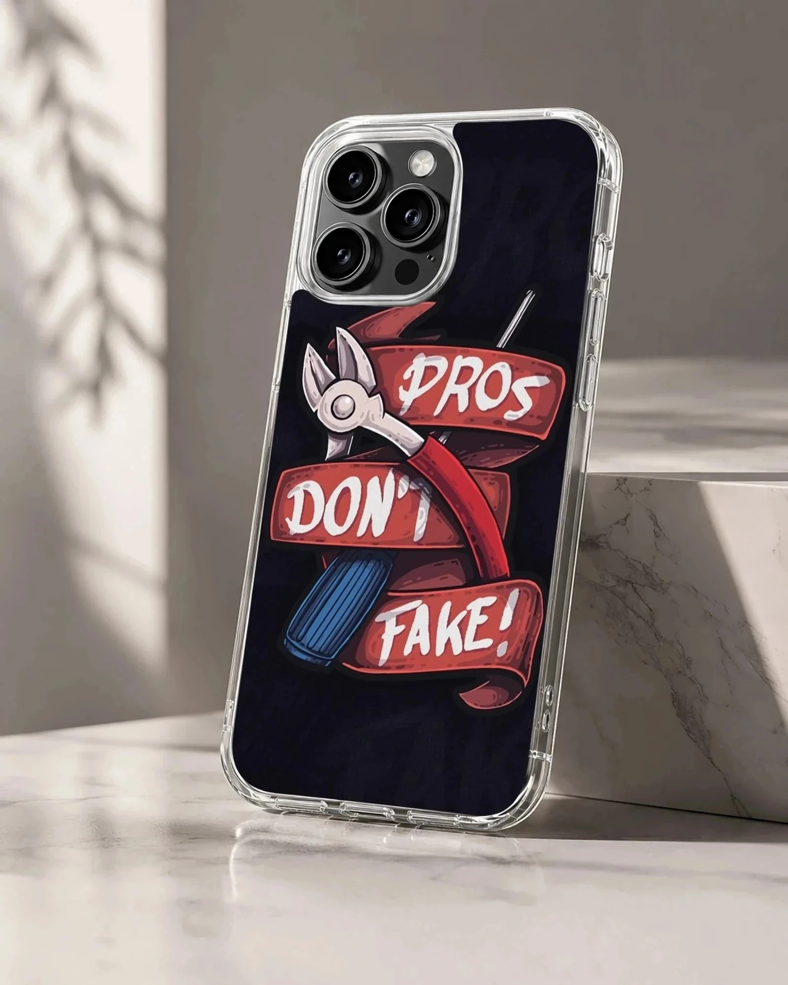 Digital illustration of tactical wirecutters and red ribbon with text pros don't fake on a phone case