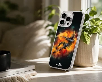 Vibrant tactical soldier explosion artwork on a black phone case — Lifestyle