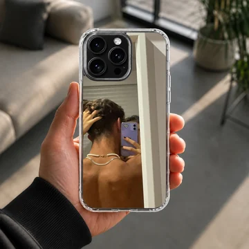Photographic print of a couple taking an intimate mirror selfie, printed on a protective phone case — Lifestyle