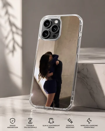 Photographic print of a couple embracing intimately against a warm neutral wall on a protective phone case. — Specs