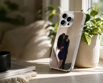 Photographic print of a couple embracing intimately against a warm neutral wall on a protective phone case. — Lifestyle