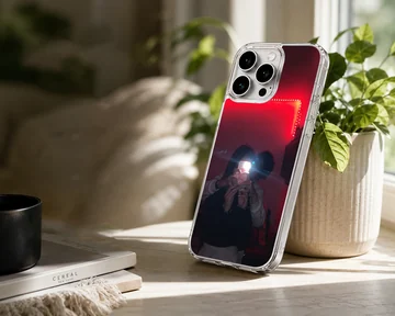 A couple taking a mirror selfie under glowing red LED lights, printed on a protective phone case — Lifestyle