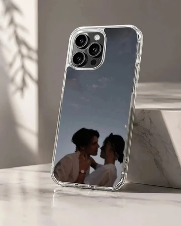 Photographic print of a romantic couple embracing against a twilight sky on a matte phone case.