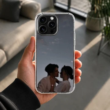 Photographic print of a romantic couple embracing against a twilight sky on a matte phone case. — Lifestyle