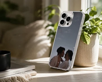 Photographic print of a romantic couple embracing against a twilight sky on a matte phone case. — Lifestyle