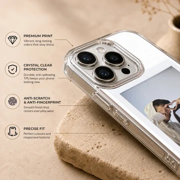 Polaroid-style photo print of a couple making a hand heart during a mirror selfie on a clear phone case. — Info