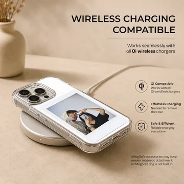 Polaroid-style photo print of a couple making a hand heart during a mirror selfie on a clear phone case. — Charging
