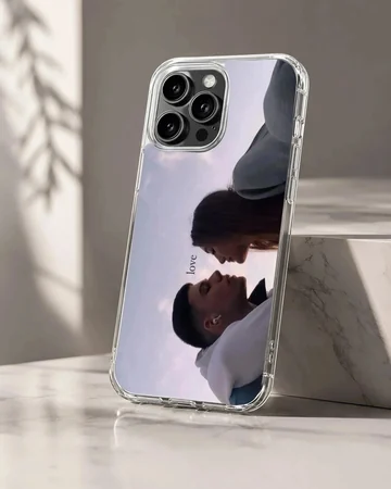 Serene couple sharing a moment with the word love on a phone case