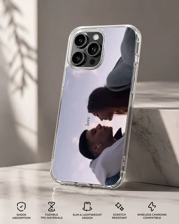 Serene couple sharing a moment with the word love on a phone case — Specs