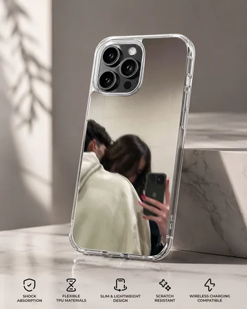 A cozy mirror selfie artwork of a couple embracing in neutral hoodie tones printed on a phone case. — Specs