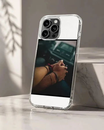 Close up photograph of a couple holding hands in a car printed on a sleek phone case