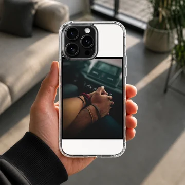 Close up photograph of a couple holding hands in a car printed on a sleek phone case — Lifestyle