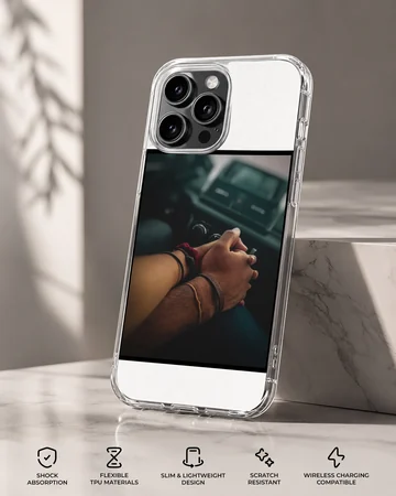 Close up photograph of a couple holding hands in a car printed on a sleek phone case — Specs