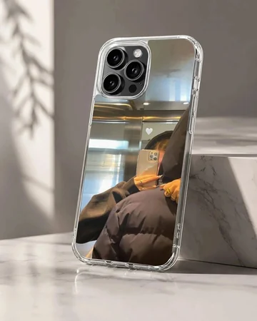 A photographic print of a couple taking a cozy elevator mirror selfie with a subtle white heart graphic phone case