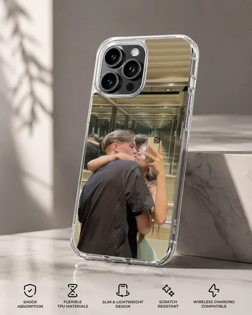 Photographic print of a young couple kissing while taking a mirror selfie in an elevator on a custom phone case — Specs