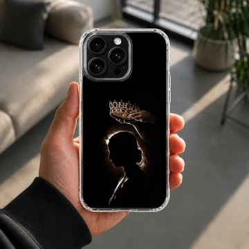 Silhouette of a woman receiving a crown on a stunning phone case — Lifestyle