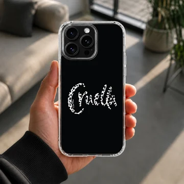 Bold typographic design of 'Cruella' on a black background phone case — Lifestyle