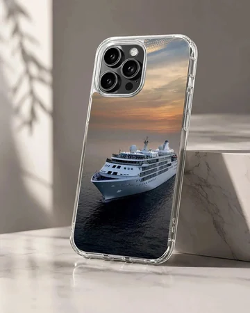 A white cruise ship sailing across dark ocean waters beneath a warm sunset sky on a phone case.