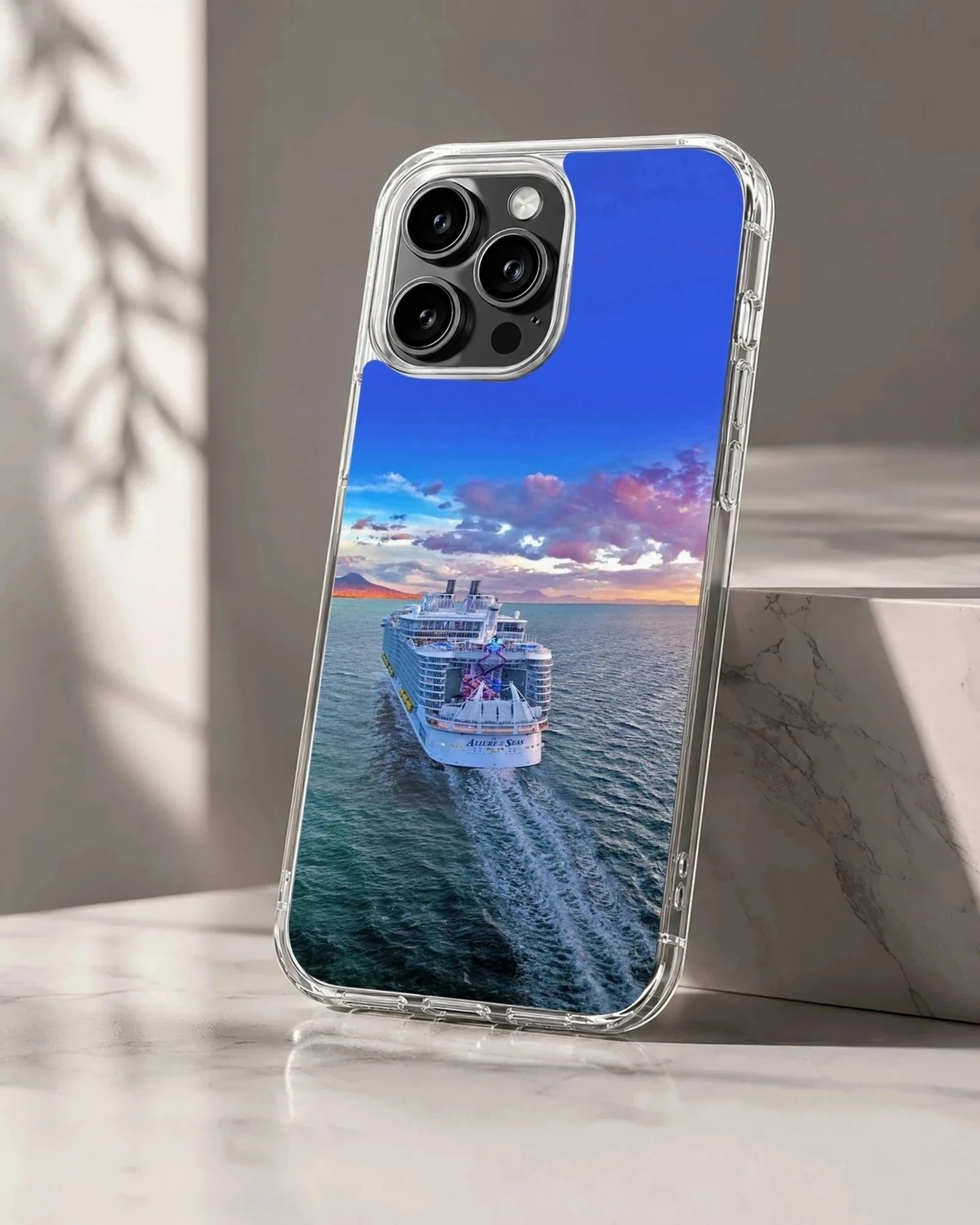 Stunning scenic view of a cruise ship sailing across the ocean phone case