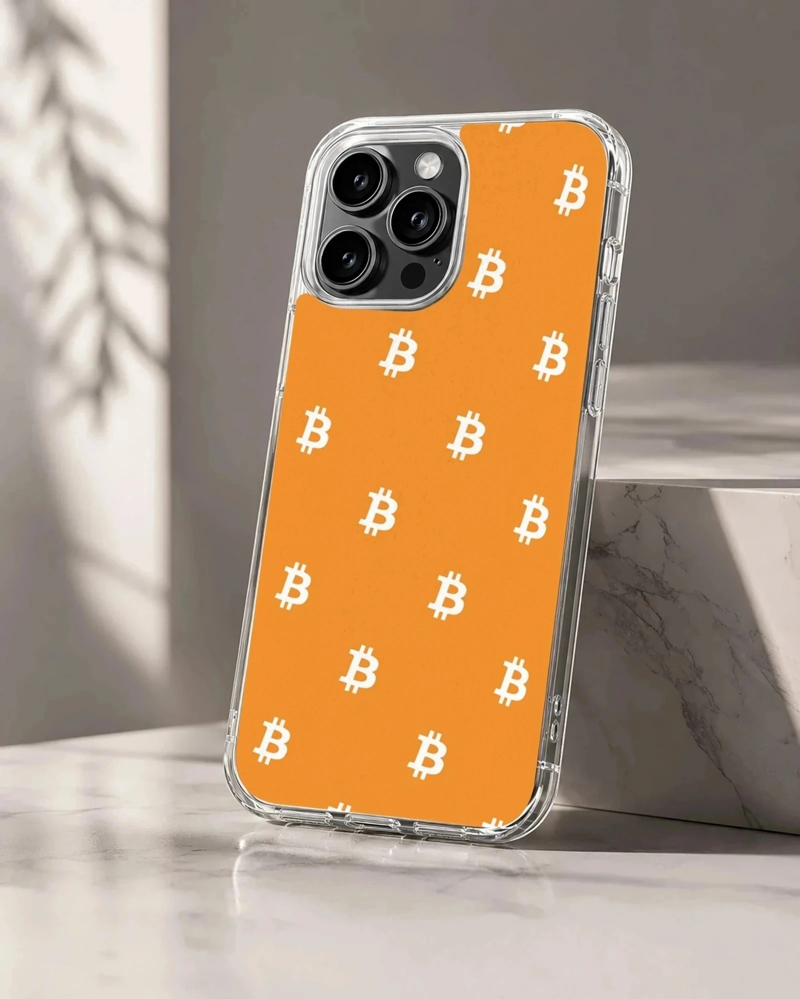 Playful bitcoin design on an orange background phone case