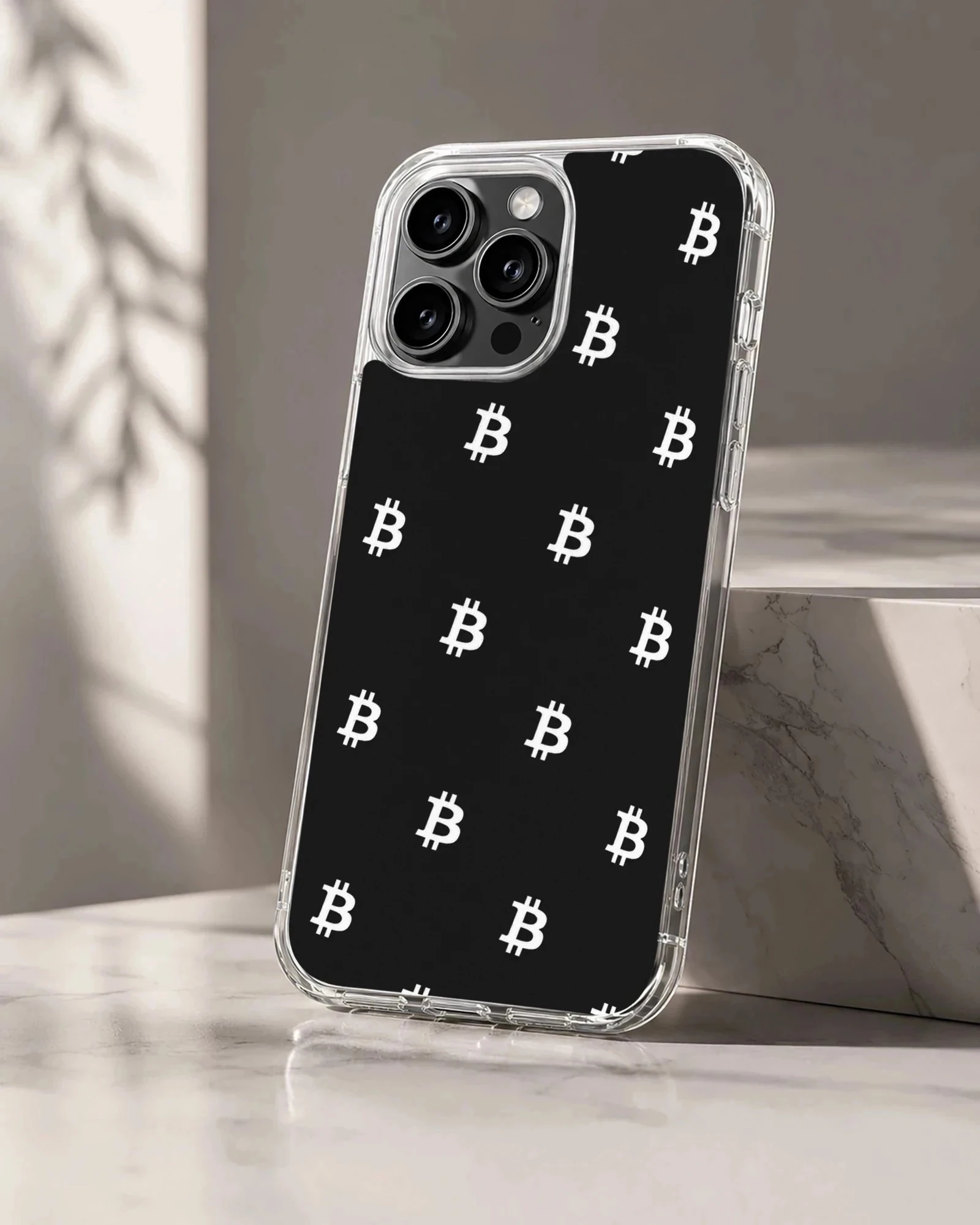 Crypto-themed phone case with white Bitcoin symbols on a black background