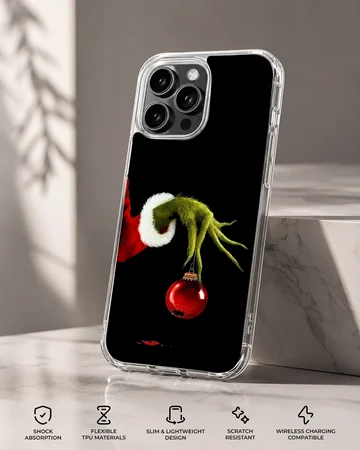 Grinch holding ornament in holiday-themed phone case — Specs