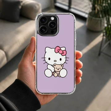 Hello Kitty cartoon phone case in pastel purple, featuring Hello Kitty with a teddy bear. — Lifestyle