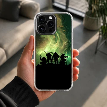 Silhouette of Ninja Turtles against vibrant green sky phone case — Lifestyle