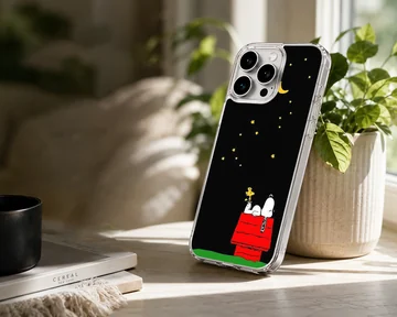Snoopy lying on red doghouse under starry night on phone case — Lifestyle