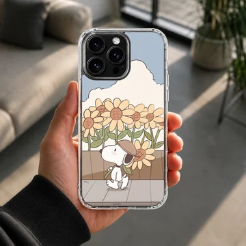Snoopy in a field of sunflowers on a whimsical phone case — Lifestyle