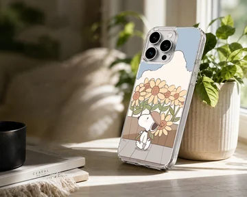 Snoopy in a field of sunflowers on a whimsical phone case — Lifestyle
