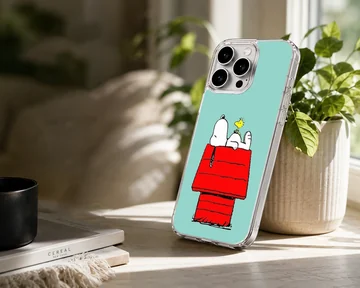 Snoopy resting on red doghouse cartoon phone case — Lifestyle