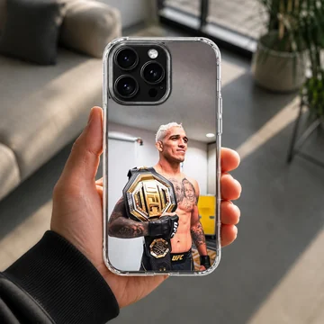 Charles Oliveira holding a gold championship belt printed on a matte phone case — Lifestyle
