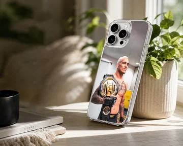 Charles Oliveira holding a gold championship belt printed on a matte phone case — Lifestyle